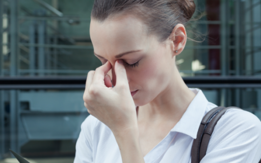 Image of frustrated woman at work