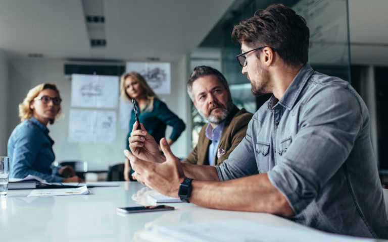 A photo of a colleague mansplaining at the office