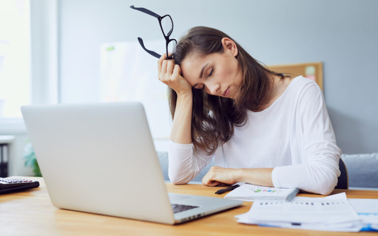 Image of woman harassed at work